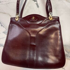 Lou Taylor vintage burgundy genuine leather handbag with built-in swivel mirror